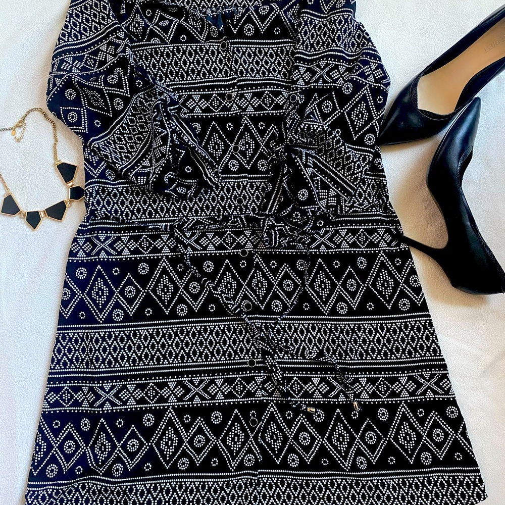 Knee length black and white patterned dress